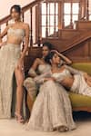 Diyarajvvir Silver Tulle Beads Asymmetric Embellished Bustirt And Skirt Set at Aza Fashions Diyarajvvir_Silver Tulle Beads Asymmetric Embellished Bustirt And Skirt Set _at_Aza_Fashions