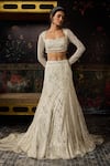 Buy Diyarajvvir Silver Tulle Beads, Sequins Square Neck Embellished Blouse With Lehenga Skirt at Aza Fashions Buy_Diyarajvvir_Silver Tulle Beads, Sequins Square Neck Embellished Blouse With Lehenga Skirt _at_Aza_Fashions
