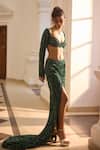 Shop_Diyarajvvir_Green Tulle Sequins Sweetheart Neck Embellished Blouse With Slit Skirt _Online_at_Aza_Fashions