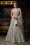 Buy_Diyarajvvir_Silver Tulle Applique, Mirrors Sweetheart Neck Work Lehenga Set _at_Aza_Fashions