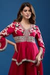 Prisho_Red Embroidery, Tassels V-neck Peplum Top And Sharara Set _at_Aza_Fashions