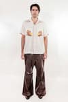 Buy_Jubinav Chadha_Brown Faux Leather Crocodile Textured Bell Bottom Pant _at_Aza_Fashions