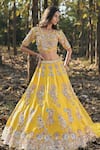 Buy Panihari Yellow Silk, Net Sequins, Cut Work Round Paisley Embroidered Bridal Lehenga Set at Aza Fashions Buy_Panihari_Yellow Silk, Net Sequins, Cut Work Round Paisley Embroidered Bridal Lehenga Set _at_Aza_Fashions