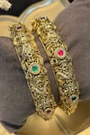 Shop_Prestones_Red Gemstones Temple Carved Bangles - Set Of 2 _Online_at_Aza_Fashions