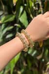 Buy_Prestones_Red Gemstones Temple Carved Bangles - Set Of 2 _at_Aza_Fashions