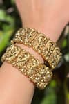 Prestones_Gold Plated Temple Motif Bangles - Set Of 2 _Online_at_Aza_Fashions