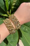 Shop_Prestones_Gold Plated Temple Motif Bangles - Set Of 2 _Online_at_Aza_Fashions
