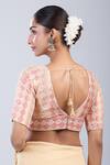Shop Samyukta Singhania Gold Brocade V-neck Geometric Pattern Blouse at Aza Fashions Shop_Samyukta Singhania_Gold Brocade V-neck Geometric Pattern Blouse _at_Aza_Fashions
