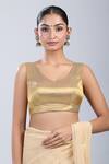Shop_Samyukta Singhania_Gold Silk V-neck Textured Self Design Blouse _at_Aza_Fashions
