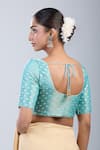 Shop_Naintara Bajaj_Blue Tissue Round Neck Butti Pattern Blouse _at_Aza_Fashions
