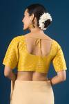 Shop_Naintara Bajaj_Yellow Tissue Round Neck Butti Pattern Blouse _at_Aza_Fashions