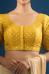 Naintara Bajaj_Yellow Tissue Round Neck Butti Pattern Blouse _Online_at_Aza_Fashions