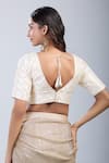 Shop_Samyukta Singhania_Gold Brocade Plunge Neck Pattern Blouse _at_Aza_Fashions