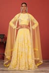 Buy_Suruchi Parakh_Yellow Net Sequins, Embroidery Round Neck Hand Lehenga Set _at_Aza_Fashions