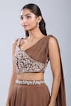 Samyukta Singhania_Brown Chinon Embroidery Asymmetric Embellished Blouse With Skirt _at_Aza_Fashions