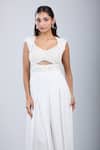Shop_Samyukta Singhania_White Chinon Sequins, Embroidery Scoop Neck Embellished Cutwork Jumpsuit _Online_at_Aza_Fashions