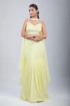 Samyukta Singhania_Yellow Chinon Sequins, Embroidery V-neck Embellished Blouse And Skirt Set _at_Aza_Fashions