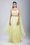 Buy_Samyukta Singhania_Yellow Chinon Sequins, Embroidery V-neck Embellished Blouse And Skirt Set _at_Aza_Fashions