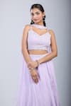 Samyukta Singhania_Purple Chinon Sequins Asymmetric Floral Embellished Blouse And Skirt Set _at_Aza_Fashions