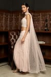 Istya_Pink Net Sequins, Beads, Embroidery Square Neck Blouse Draped Skirt Set _at_Aza_Fashions