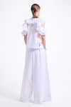 Shop_Gauri & Nainika_White Poplin, Cotton Embroidery, Cold Shoulder Ruffle Top With Wide Legged Pant _at_Aza_Fashions