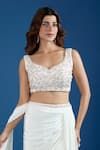 Samyukta Singhania_Ivory Chinon Cut Work, Sequins Leaf Embroidered Blouse With Pre-draped Saree _at_Aza_Fashions