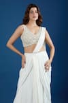 Samyukta Singhania_Ivory Chinon Embroidery, Mirrors V-neck Blouse With Pre-draped Saree _Online_at_Aza_Fashions