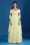Samyukta Singhania_Yellow Chinon Cut Work, Sequins Off-shoulder Asymmetric Embroidered Gown _Online_at_Aza_Fashions
