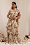 Buy_Surkh Syahi_Beige Chinon V-neck Madhaniya Draped Saree With Blouse _at_Aza_Fashions