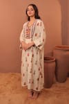 Buy_Surkh Syahi_Off White Cotton, Muslin Beads, Sequins Round Neck Albeli Tassel Bordered Dress _Online_at_Aza_Fashions