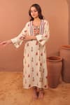 Buy_Surkh Syahi_Off White Cotton, Muslin Beads, Sequins Round Neck Albeli Tassel Bordered Dress _at_Aza_Fashions