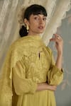 Kritika Dawar_Yellow Chanderi, Cotton Embroidery Split V-neck Nora Dori A-line Kurta Set _at_Aza_Fashions