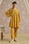 Buy_Kritika Dawar_Mustard Tissue, Chanderi Sequins V-neck Zaina Hand Embroidered Kurta Set _at_Aza_Fashions