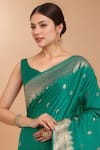 Samyukta Singhania_Turquoise Zari Round Neck Woven Banarasi Saree With Blouse _at_Aza_Fashions