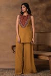 Buy_Isha Gupta Tayal_Mustard Gold Peplum Top & Pant Set _at_Aza_Fashions