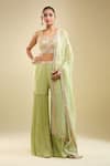 Buy_Samyukta Singhania_Green Georgette Sequins, Beads, Pom-poms Leaf Embroidered Blouse Gharara Set _at_Aza_Fashions