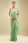 Buy_Samyukta Singhania_Mint Georgette Sequins, Beads, Embroidery Ruffle Pre-draped Saree With Blouse _at_Aza_Fashions