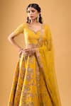 Azeera_Yellow Tassels, Embroidery Leaf Neck Mustard Floral Lehenga Set _Online_at_Aza_Fashions