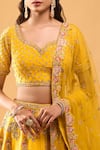 Azeera_Yellow Tassels, Embroidery Leaf Neck Mustard Floral Lehenga Set _at_Aza_Fashions