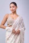 Azeera_Ivory Embroidery, Sequins, Zari Floral Saree With Unstitched Blouse Piece _at_Aza_Fashions