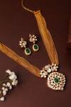 Shop_Curio Cottage_Gold Plated Gemstones, Radiant Harmony Kundan Set _at_Aza_Fashions