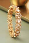 Shop_Curio Cottage_Gold Plated Diamonds Meira Gleaming Kundan Bangle _at_Aza_Fashions