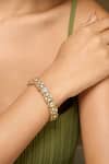 Buy_Curio Cottage_Gold Plated Diamonds Meira Gleaming Kundan Bangle _at_Aza_Fashions
