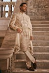 Shop_Jigar & Nikita_Ivory Vegan Silk, Chanderi Silk, Linen, Satin The Kingdom Work Sherwani Set _at_Aza_Fashions