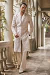 Shop_Jigar & Nikita_Ivory Silk, Chanderi Silk, Linen, Satin Embroidery Wispers Of Wat Sherwani Set _Online_at_Aza_Fashions