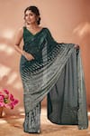 Samyukta Singhania_Green Georgette Sequins Embroidered Saree With Unstitched Blouse Piece _at_Aza_Fashions