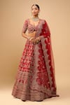 Buy Azeera Red Tassels, Embroidery V-neck Bridal Lehenga Set at Aza Fashions Buy_Azeera_Red Tassels, Embroidery V-neck Bridal Lehenga Set _at_Aza_Fashions