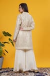 Shop_Saangi_Ivory Crepe Sequins Sweetheart , Open Gold Embellished Jacket Set _at_Aza_Fashions