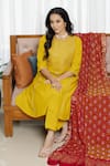 Shop_Saangi_Red Organza, Chanderi Silk Zari, Sequins, Embroidery Round Mustard Kurta Set _Online_at_Aza_Fashions