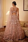 Shop_Opus Atelier_Peach Tulle, Net Mirrors, Embroidery, Sequins V-neck Lehenga Set _at_Aza_Fashions
